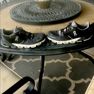 On Running Black and White Athletic Shoes with Mesh Upper